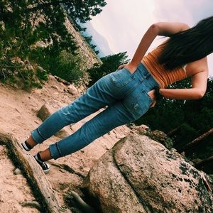 Ripped knee, high waisted, boyfriend jeans.